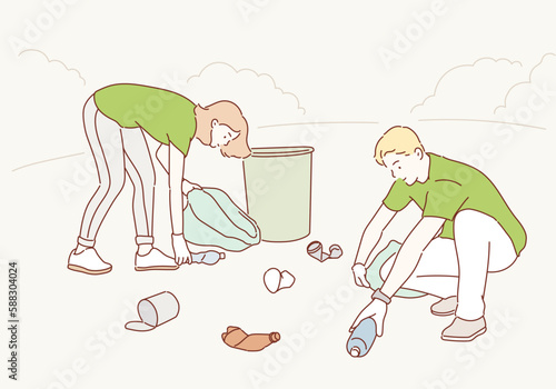 Friends picking up litter in city garden. Hand drawn style vector design illustrations.