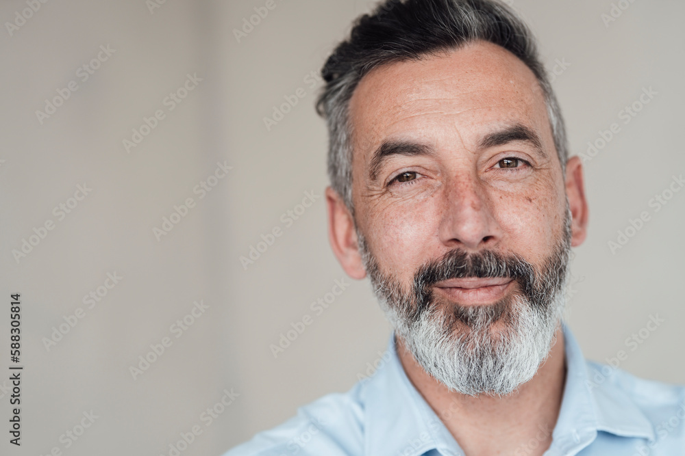 Smiling mature businessman with beard Smiling mature businessman with beard