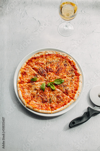 Traditional Italian pizza, vegetables, ingredients on a light background.Pizza menu. View from above. Place for text.