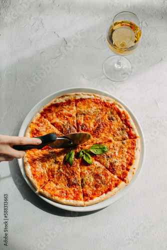 Traditional Italian pizza, vegetables, ingredients on a light background.Pizza menu. View from above. Place for text.