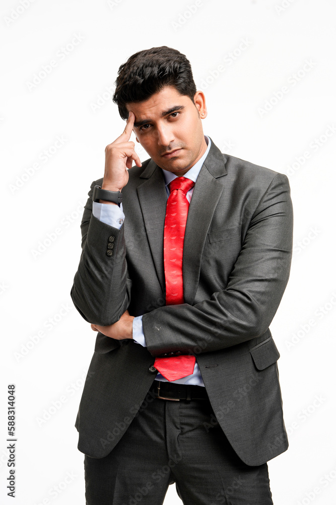 Young indian businessman in stress or thinking some on white background.