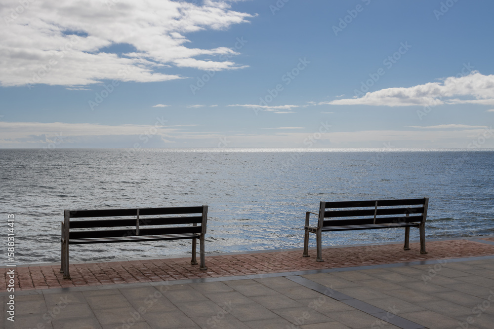 Two empty benches and Atlantic ocean, Spain