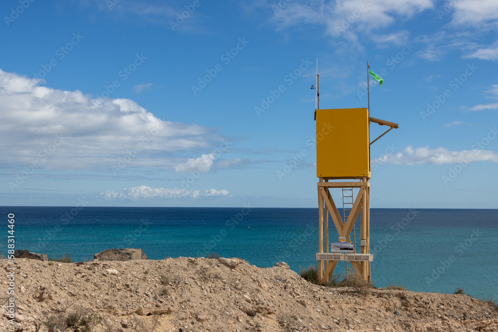 Lifeguard yellow tower, Playa de Sotavento, Spain Lifeguard yellow tower, Playa de Sotavento, Spain