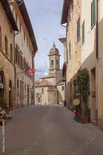 narrow street in the village of  San Quirico d'Orcia in Italy © antomat