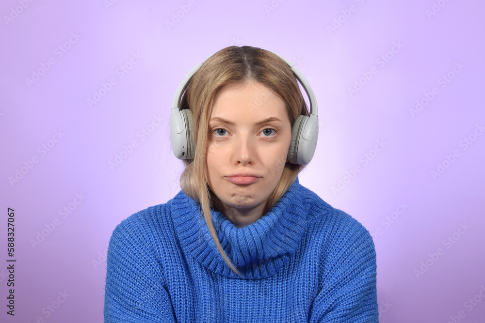 portrait of a disappointed young woman with headphones portrait of a disappointed young woman with headphones