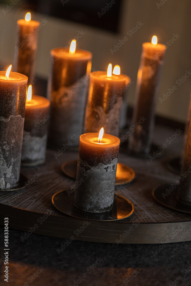 Candle lights on a kitchen table Candle lights on a kitchen table