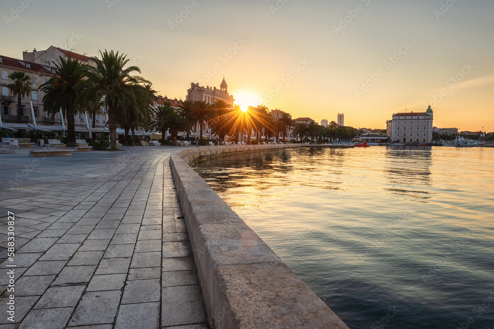 Scenic view of the Split seafront at sunrise, beautiful cityscape with old city and Diocletian’s palace, outdoor travel background, Dalmatia, Croatia. Famous tourist destination in Europe