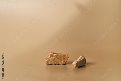 Fototapeta Naklejka Na Ścianę i Meble -  A podium, stand, stage or platform made of two natural stones for the presentation of your products with space for copying. High quality photo