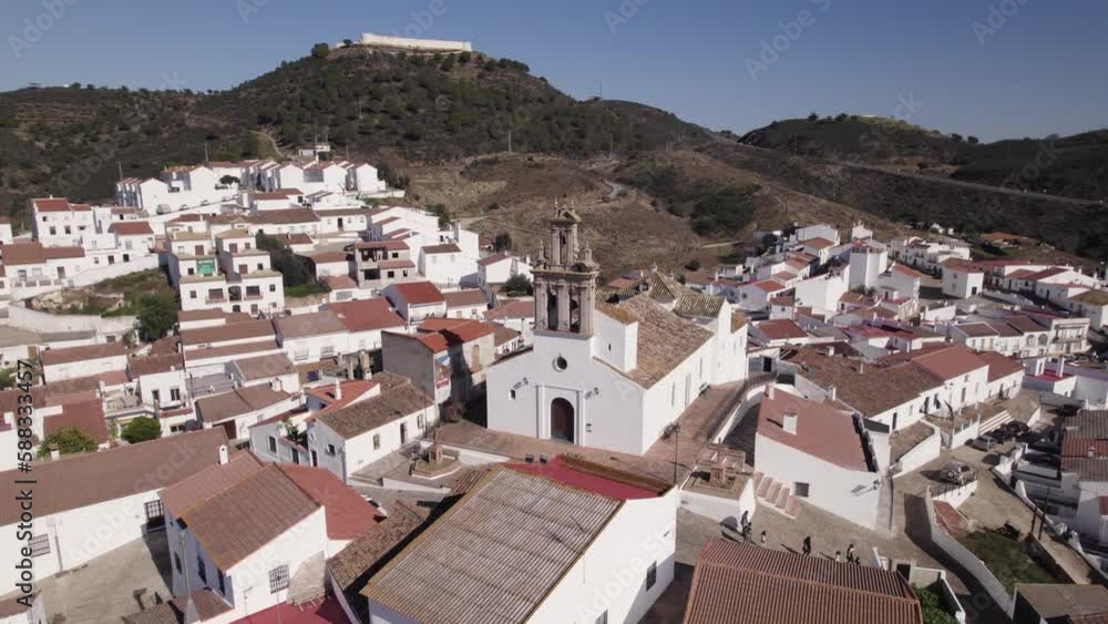 Circling aerial view of main church in Sanlucar de Guadiana and San Marcos castle, Spain Circling aerial view of main church in Sanlucar de Guadiana and San Marcos castle, Spain