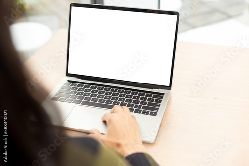 computer screen blank mockup.hand woman work using laptop with white background for advertising,contact business search information on desk at coffee shop.marketing and creative design