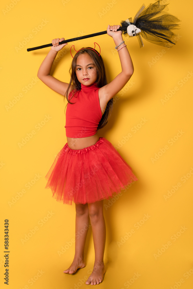 Φωτογραφία Closeup photo of funny little lady with long hair and headband playing helloween