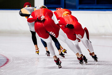 back male skaters running mass start speed skating race, winter sports competition