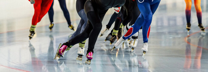 legs women skaters running mass start speed skating race, winter sports competition