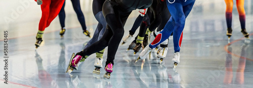 legs women skaters running mass start speed skating race, winter sports competition