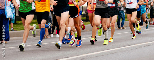 group male and female runners running marathon, athletes jogging city race, summer sports event
