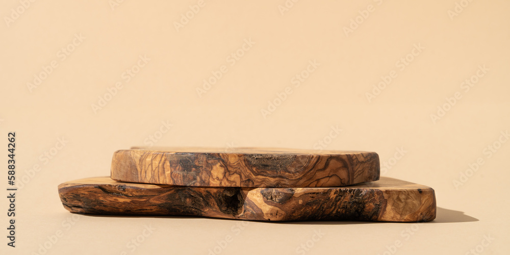 Fototapeta premium Podium cosmetics, food or jewelry background. Rustic wood pieces stage. Front view. 