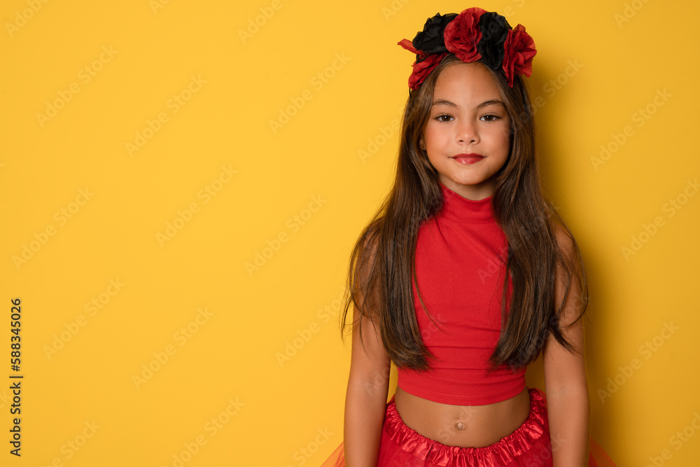 Close up portrait of beautiful little kid girl in halloween costume showing okay sign isolated over yellow background. Halloween concept. Close up portrait of beautiful little kid girl in halloween costume showing okay sign isolated over yellow background. Halloween concept.