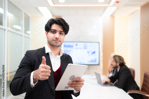 Wallpaper Mural Portrait of young entrepreneurs are enthusiastically taking their ideas and sharing perspectives. In the meeting room of an international business corporation, Torontodigital.ca