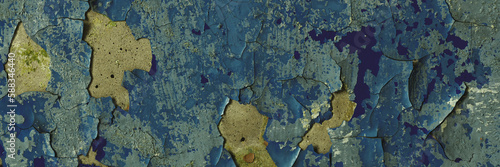 Peeling paint on the wall. Panorama of a concrete wall with old cracked flaking paint. Weathered rough painted surface with patterns of cracks and peeling. Panoramic texture for background and design. © Andrei Stepanov