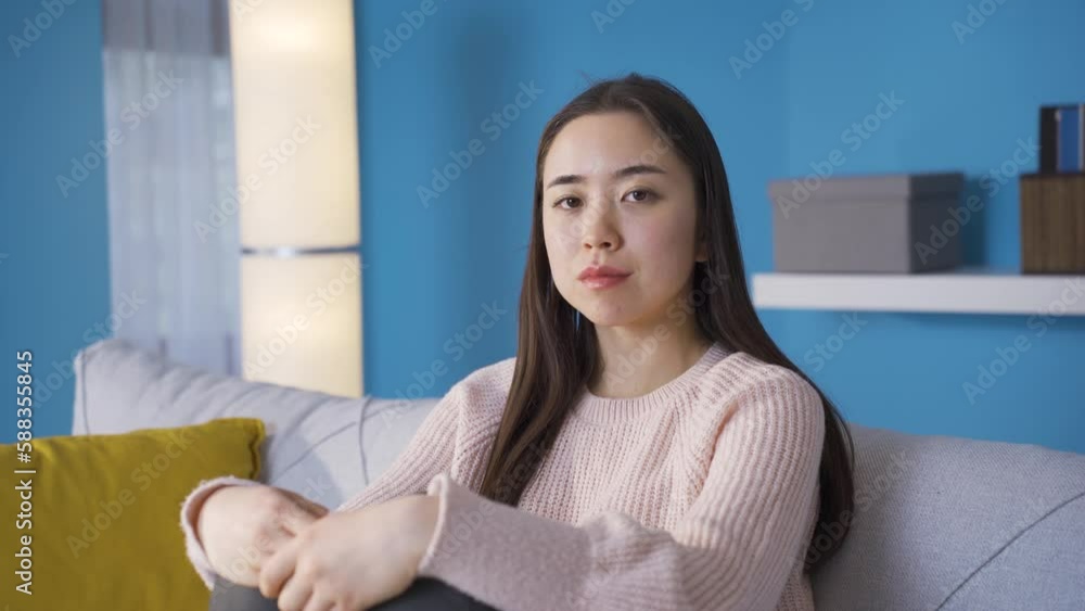 Asian young woman looking at camera.
Depressed, restless, bored Asian young woman at home looking at camera.
Asian young woman looking at camera.
Depressed, restless, bored Asian young woman at home looking at camera.