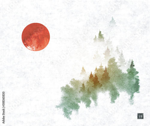 Green pine trees on misty mountain and big red sun. Traditional oriental ink painting sumi-e, u-sin, go-hua on rice paper background. Translation of hieroglyph - zen