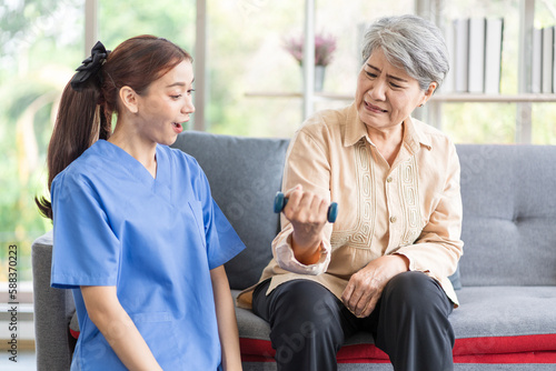 Wallpaper Mural Asian women are being cared for by nurses who monitor health and physical therapy for elderly women living alone at home. by walking on a cane or using muscles Torontodigital.ca