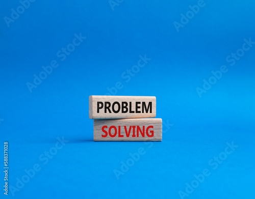 Problem solving symbol. Concept word Problem solving on wooden blocks. Beautiful blue background. Business and concept. Copy space