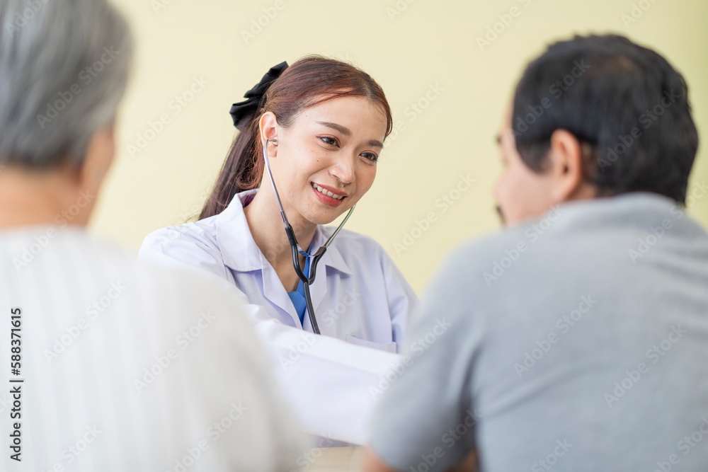 Asian doctor talking to patient with smile to encourage patients at the hospital Asian doctor talking to patient with smile to encourage patients at the hospital