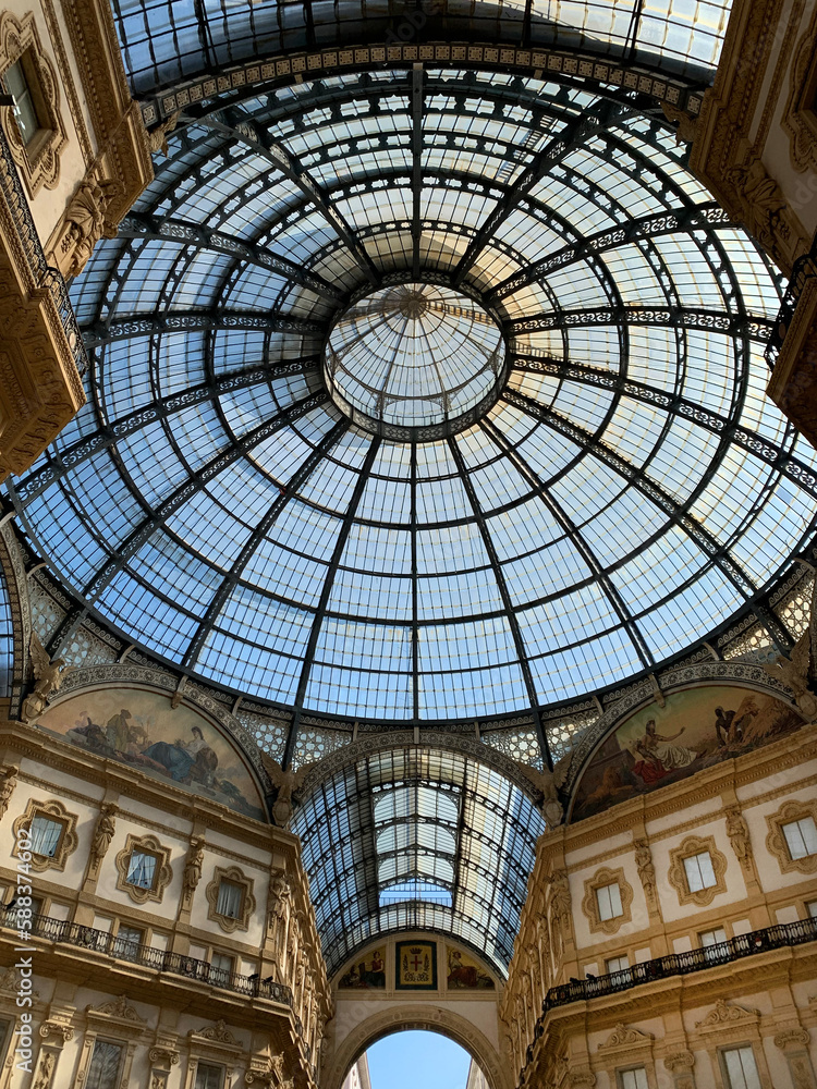 Glass roof of the Galleria Vittorio Emanuele II, famous shopping gallery in Milan, Italy