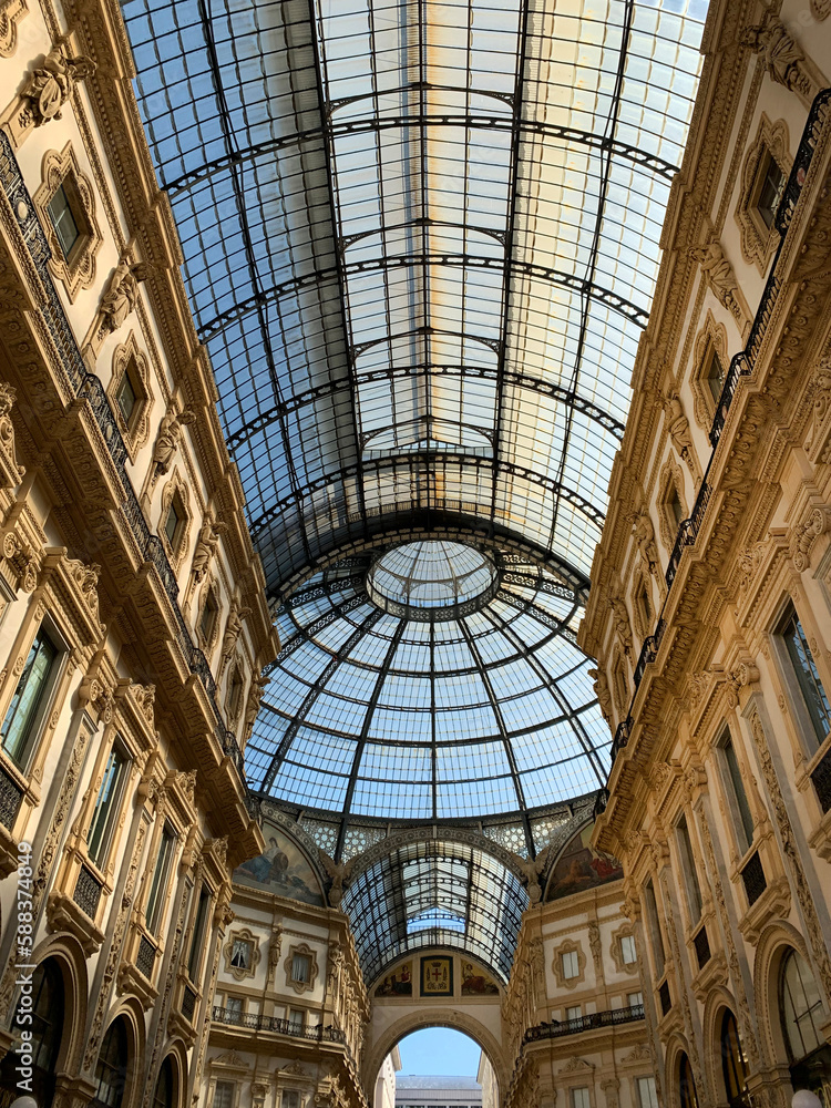 Glass roof of the Galleria Vittorio Emanuele II, famous shopping gallery in Milan, Italy