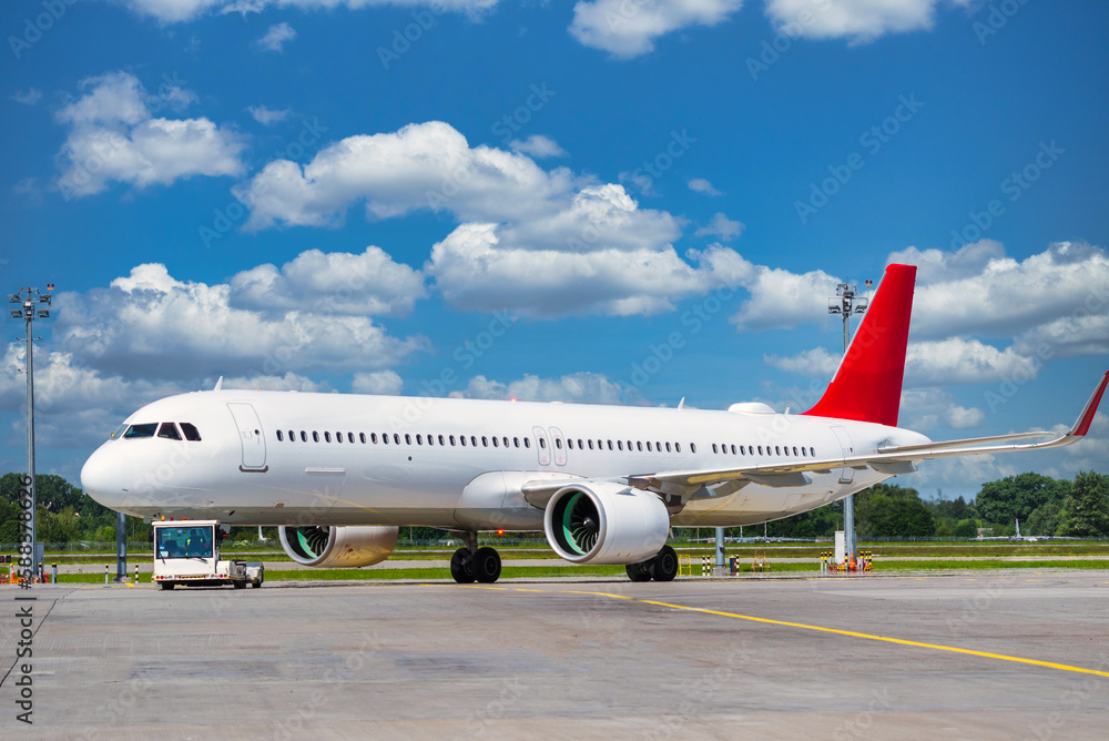 White aircraft on at airfield, tow truck transporting plane White aircraft on at airfield, tow truck transporting plane
