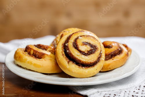 Kanelbulle - swedish cinnamon rolls on the table. photo