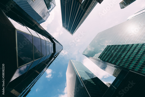 Canvas Print Modern office building low angle view of skyscrapers in city of Singapore