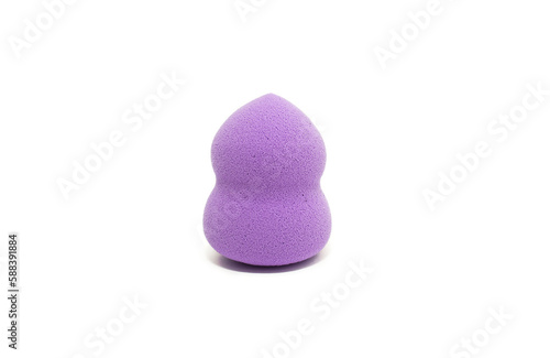 Purple makeup sponge on a white background. Means for applying professional make-up