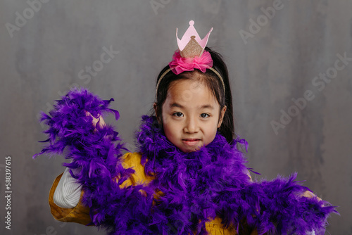 Portrait of little japanese girl in princess costume.