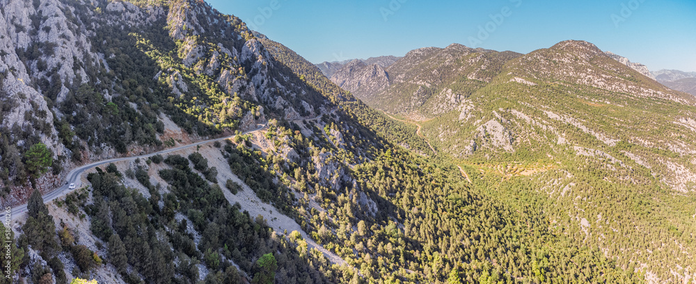 Aerial panoramic view of a scenic highway road at the dangerous and majestic gorge and canyon in Taurus mountains in Turkiye