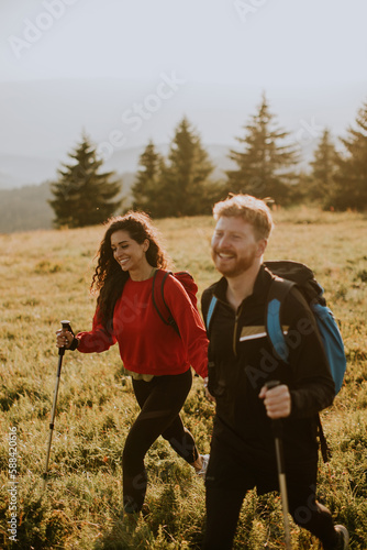 Young couple walking with b...