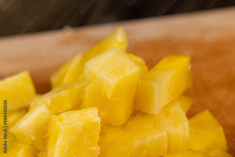 sliced pulp of peeled ripe pineapple , close up sliced pulp of peeled ripe pineapple , close up