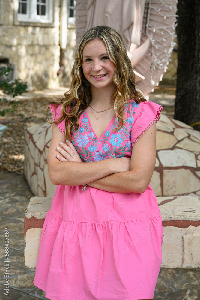 Young pretty teenage girl posing in a historic setting for her high school graduation photos Young pretty teenage girl posing in a historic setting for her high school graduation photos