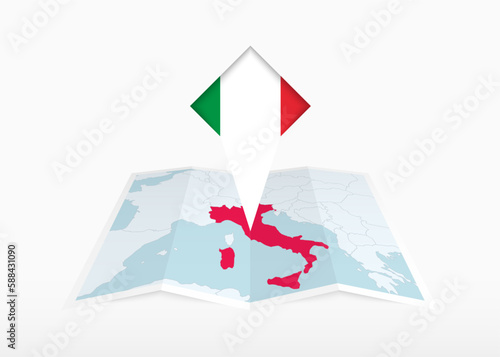 Italy is depicted on a folded paper map and pinned location marker with flag of Italy.