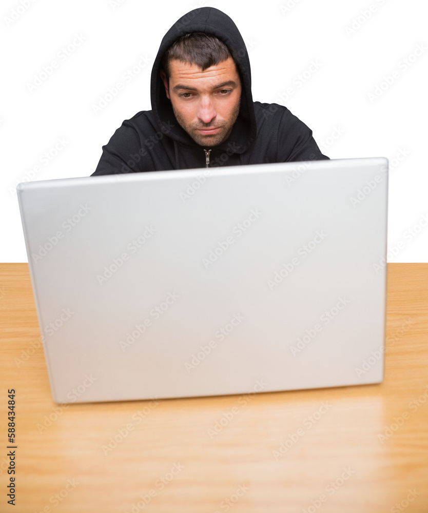 Hacker using laptop to steal identity at desk Hacker using laptop to steal identity at desk
