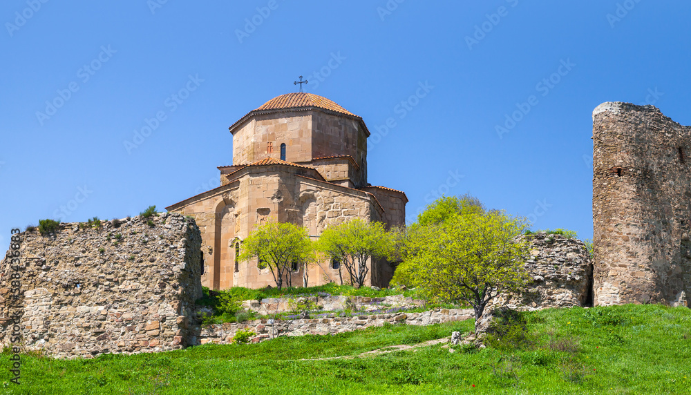 Georgian landscape with the Jvari Monastery on a sunny day