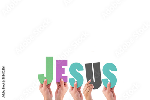 Cropped hands holding colorful word Jesus 
