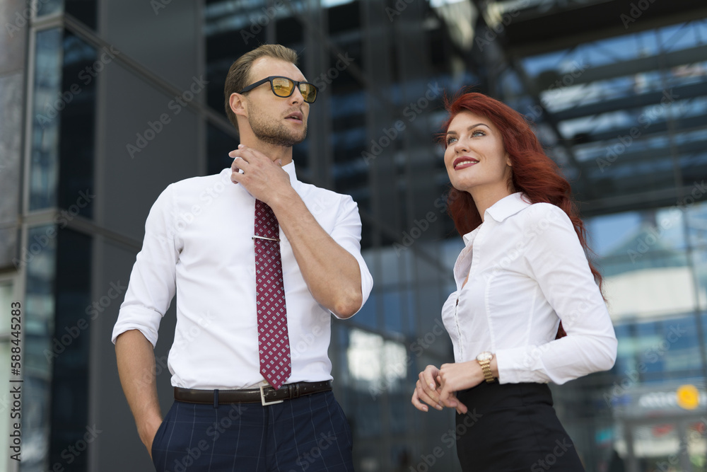 Business people in front of their office Business people in front of their office