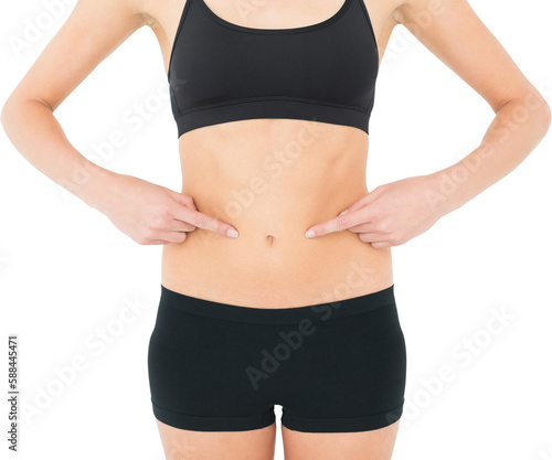 Closeup mid section of a fit woman with hands on stomach © vectorfusionart