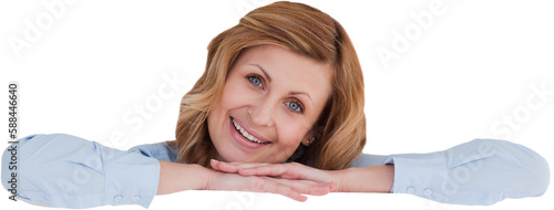 Smiling blondhaired woman standing behind a white board photo