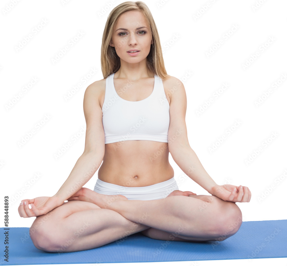 Portrait of young woman sitting in lotus position Portrait of young woman sitting in lotus position