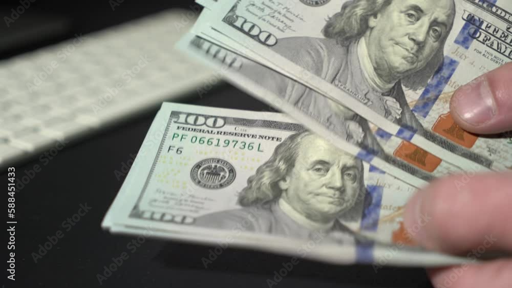 Hands counting cash US dollars banknotes. Close up View. 4k video Hands counting cash US dollars banknotes. Close up View. 4k video
