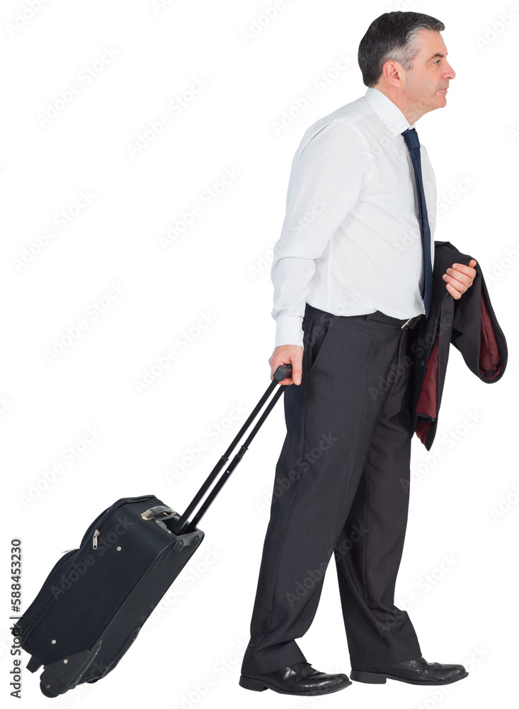 Mature businessman pulling his suitcase Mature businessman pulling his suitcase