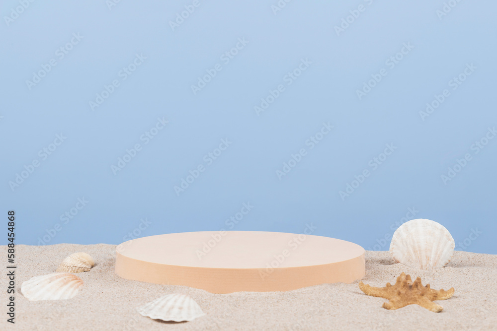 Empty round beige platform podium with sea shells and starfish on white beach sand over blue background. Minimal creative composition background for cosmetics or products presentation. Front view Empty round beige platform podium with sea shells and starfish on white beach sand over blue background. Minimal creative composition background for cosmetics or products presentation. Front view